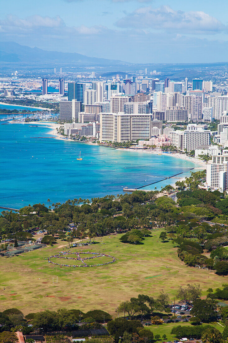 'Kapiolani park and buildings along the coastline; Waikiki, Oahu, Hawaii, United States of America'