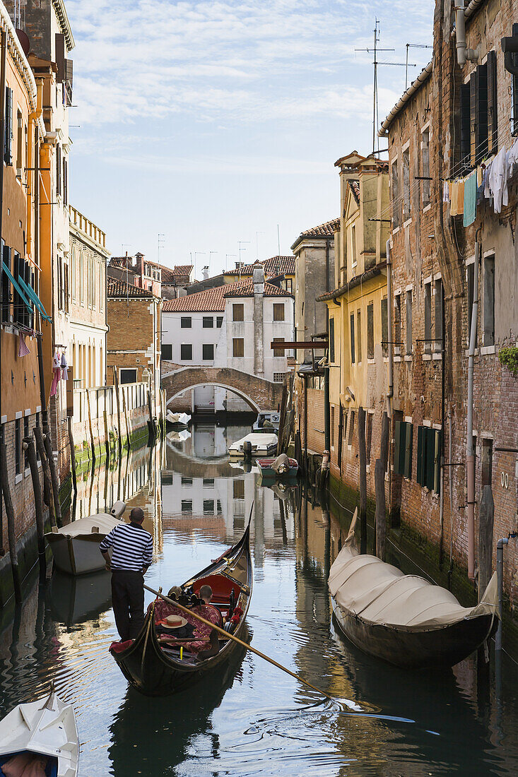 'Gondola In A Canal; Venice, Italy'