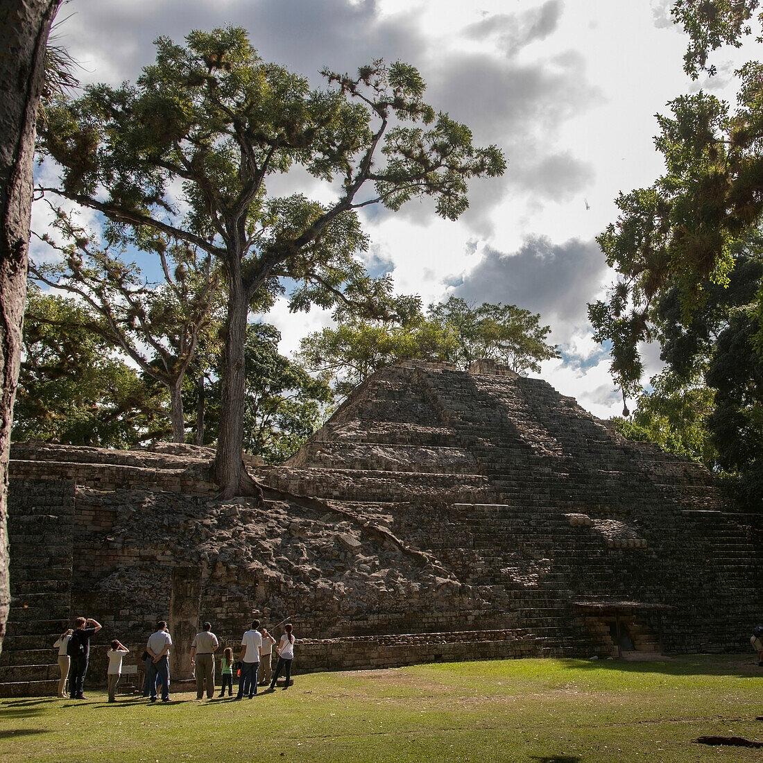 'A Group Of Tourists In A Maya Civilization At Copan Ruins; Copan, Honduras'
