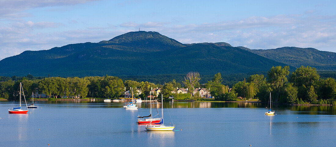 'Sailboats On Lac Memphremagog With Mont Orford In Background; Magog, Quebec, Canada'