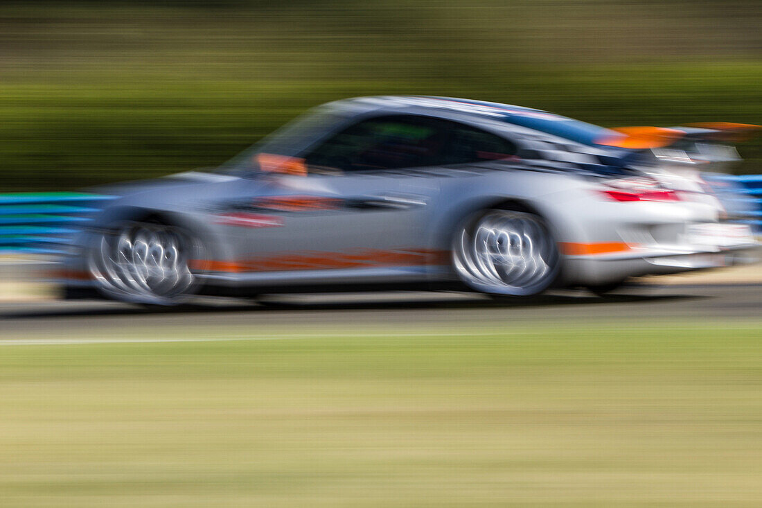 Porsche 997 gt3 on the track with a blurred background, pro'pulsion, driving courses on a race track, dreux, eure-et-loir (28), france