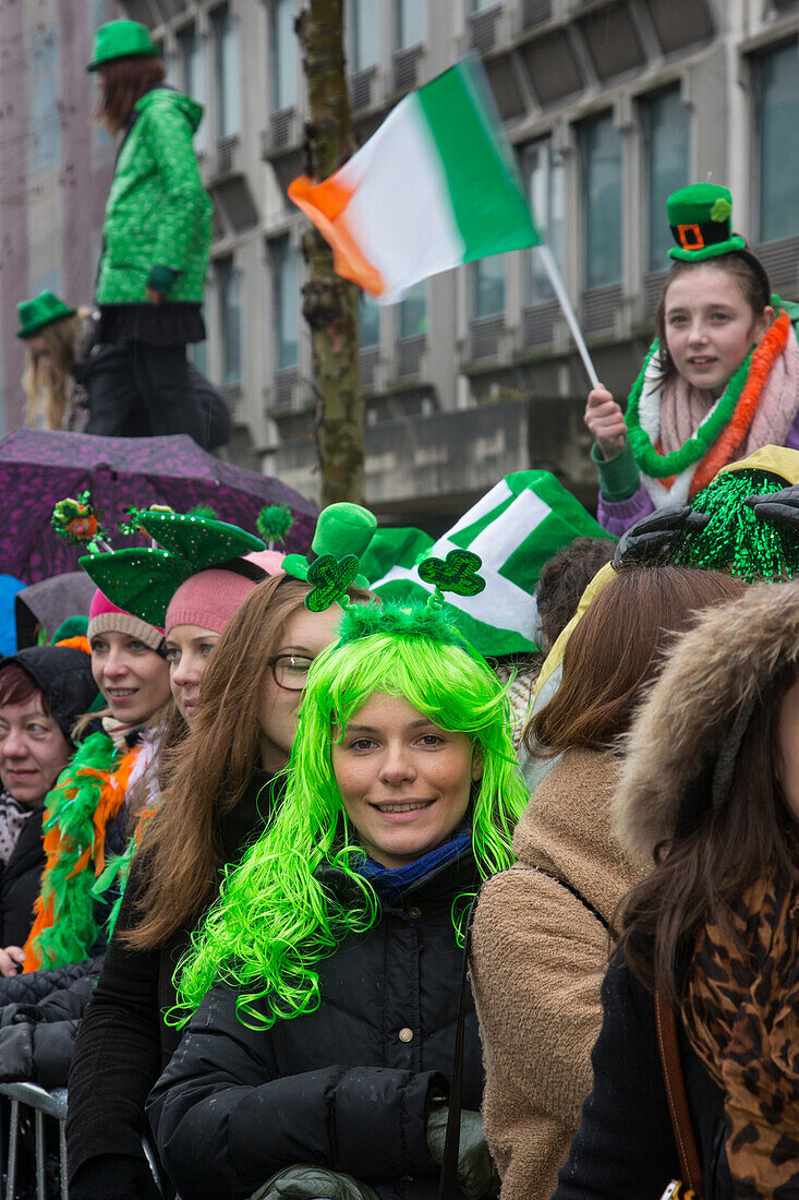 Spectators wearing the green colour of the irish clover, saint patrick's day, dublin, ireland