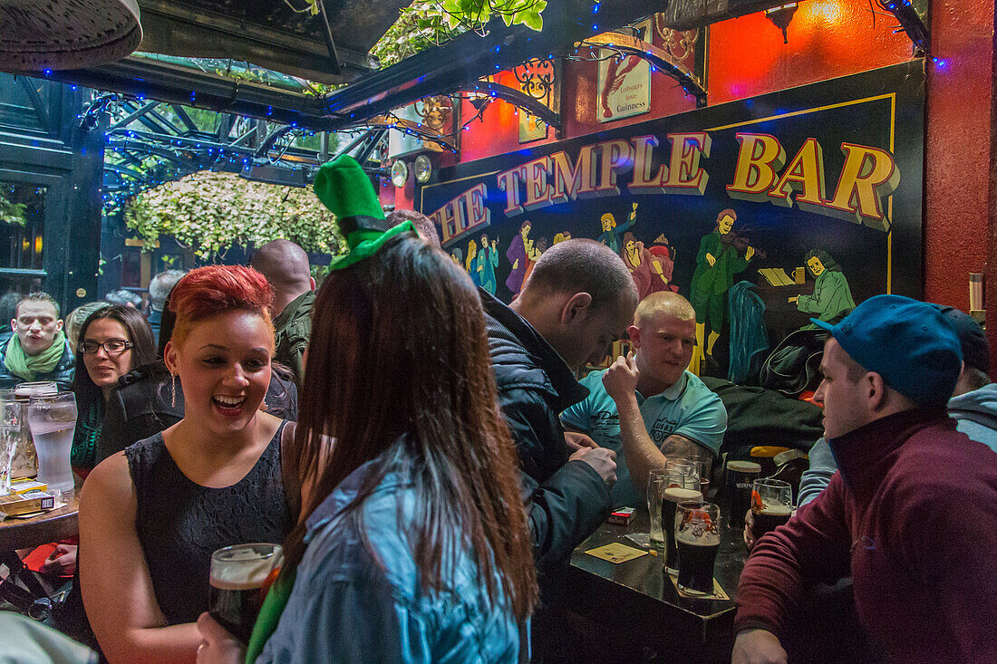 Festive ambiance inside temple bar, temple lane south, dublin, ireland