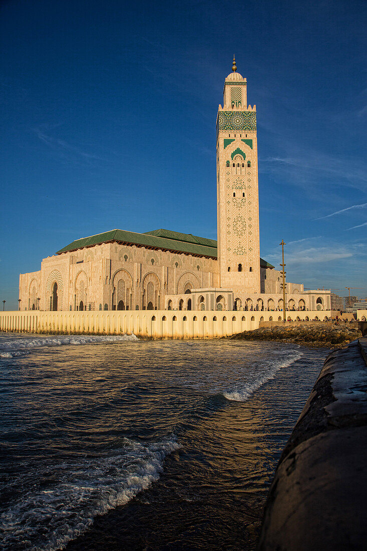 The hassan ii mosque partly erected over the sea in arab-andalusian tradition, casablanca, morocco, africa