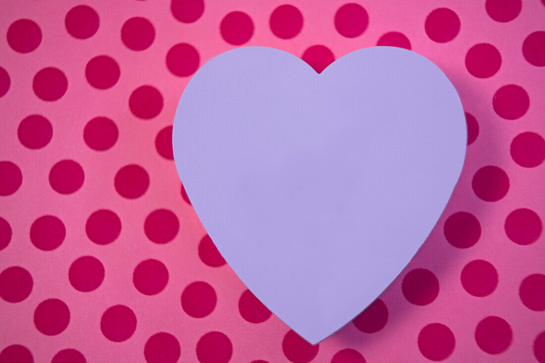 Purple Heart on Pink Background