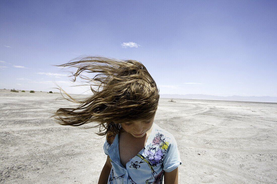 Young Girl With Hair Blowing in Wind, Salt Lake, Utah, USA