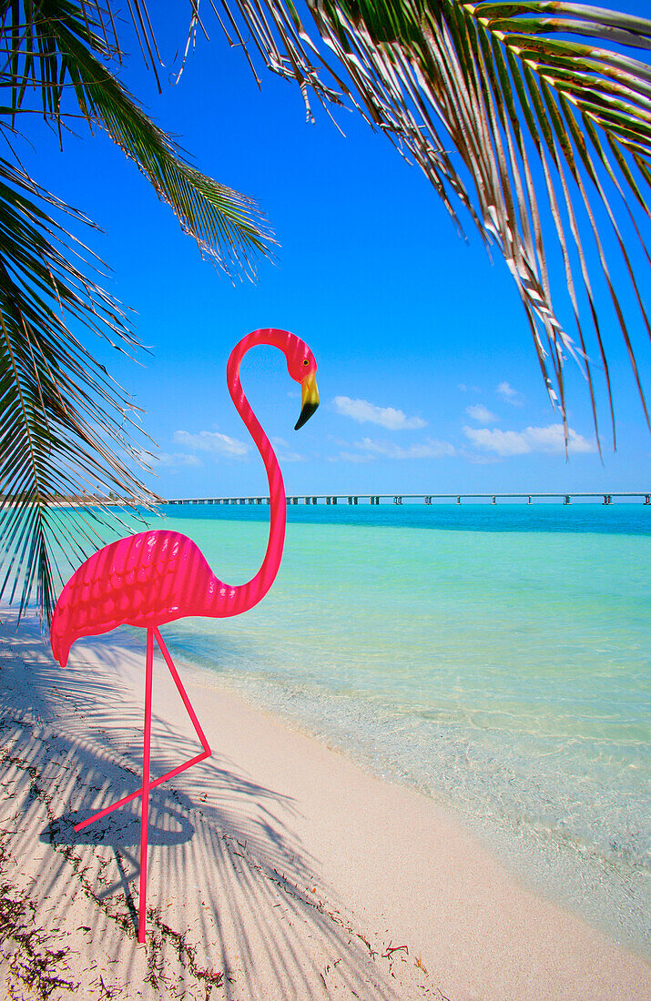 Pink Flamingo Decoration On Tropical Beach