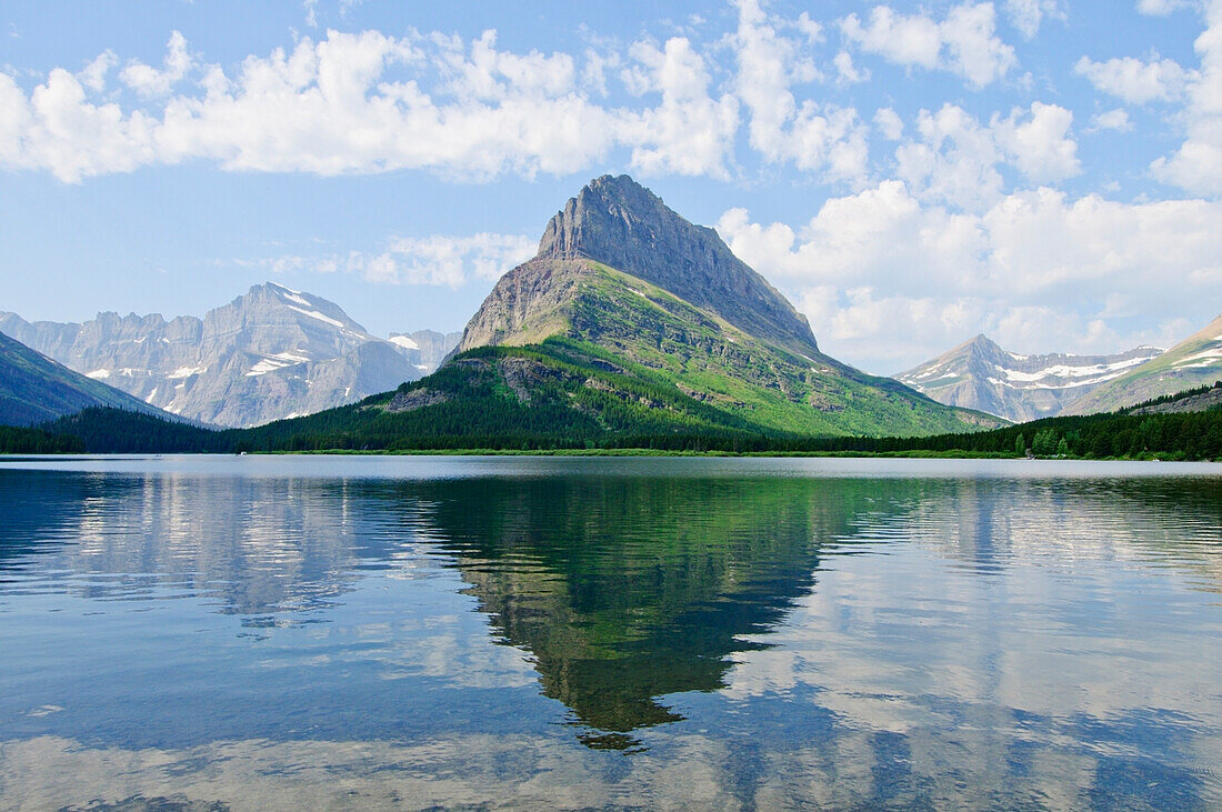 'Montana, United States Of America; Swiftcurrent Lake And Grinnell Point In Glacier National Park'