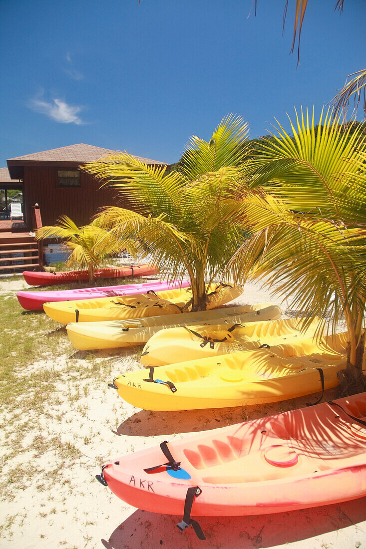 'Roatan, Bay Islands, Honduras; Kayaks On The Beach At Anthony's Key Resort'