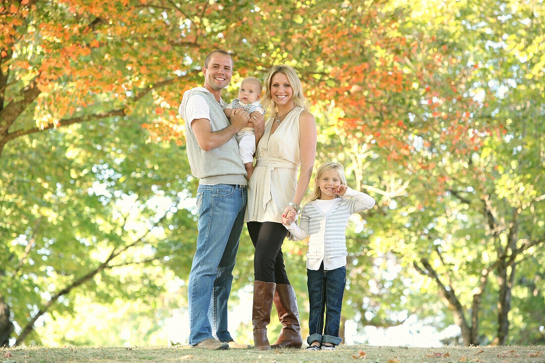 'A Family Portrait In A Park; Gresham, Oregon, Usa'