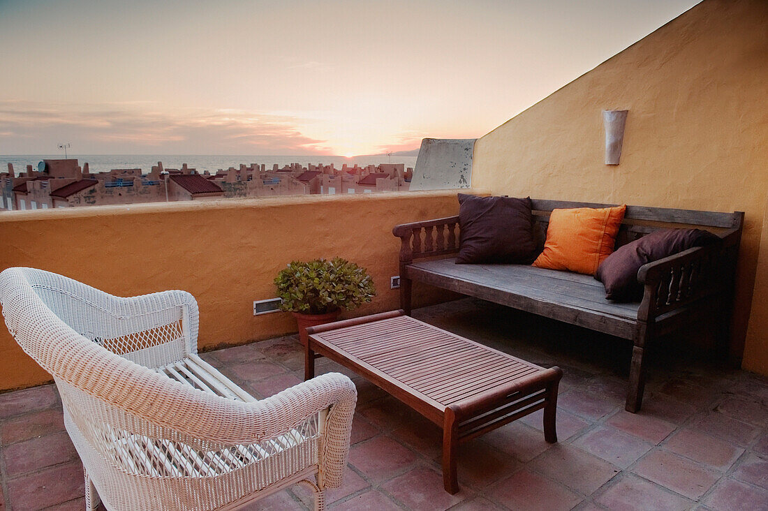 'Furniture On An Outdoor Patio Near Los Lances Beach; Tarifa, Cadiz, Andalusia, Spain'