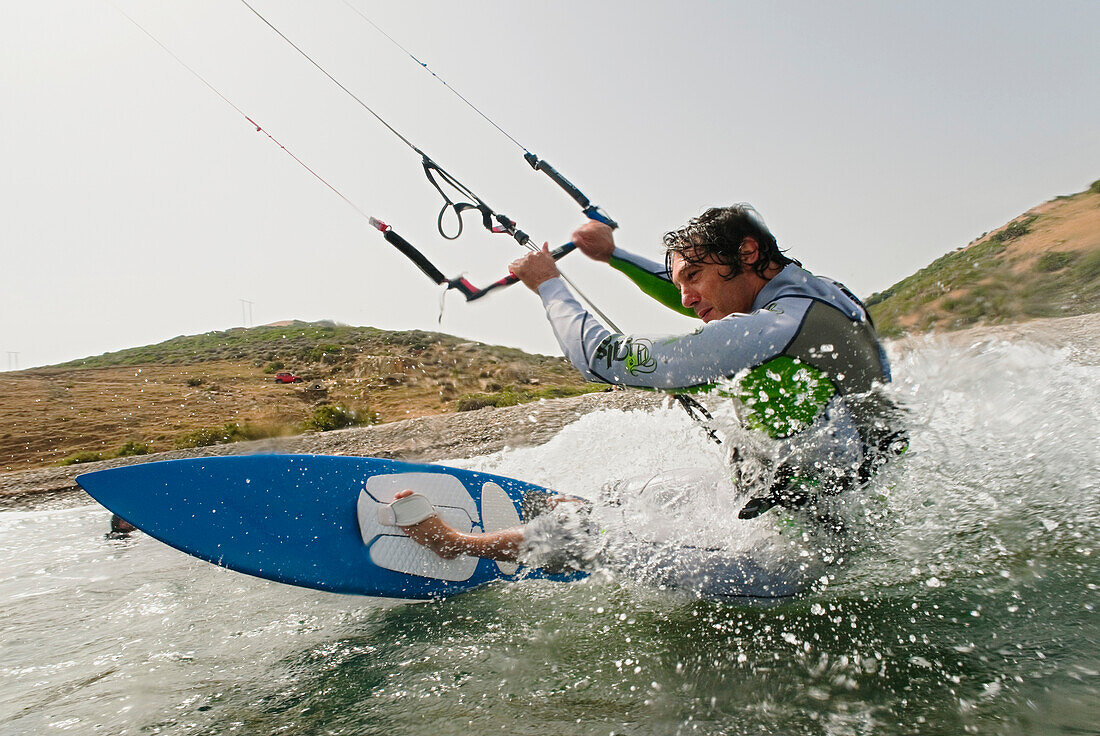 'A Man Kite Surfing Off The Coast Of Parque Natural Del Estrecho; Tarifa, Cadiz, Andalusia, Spain'
