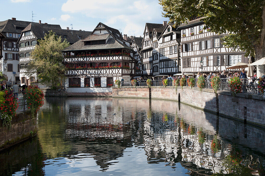 'Medieval Timber Style Buildings Reflected In A Canal; Strasbourg, France'