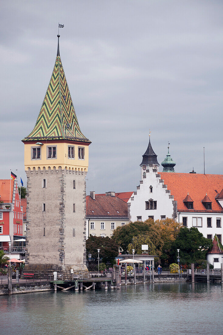 'Bavarian Tower With Colorful Tile Roof Along The Waterfront; Lindau, Germany'