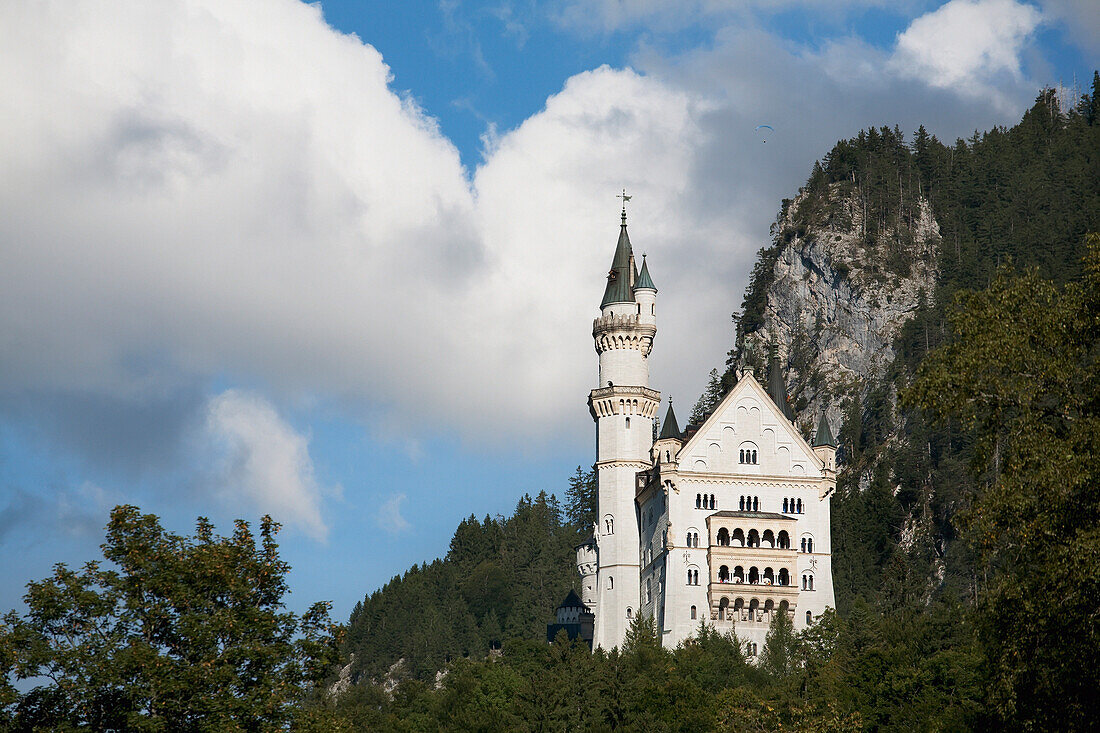 'Bavarian Castle On A Mountain Side With Clouds Overhead; Fussen, Germany'