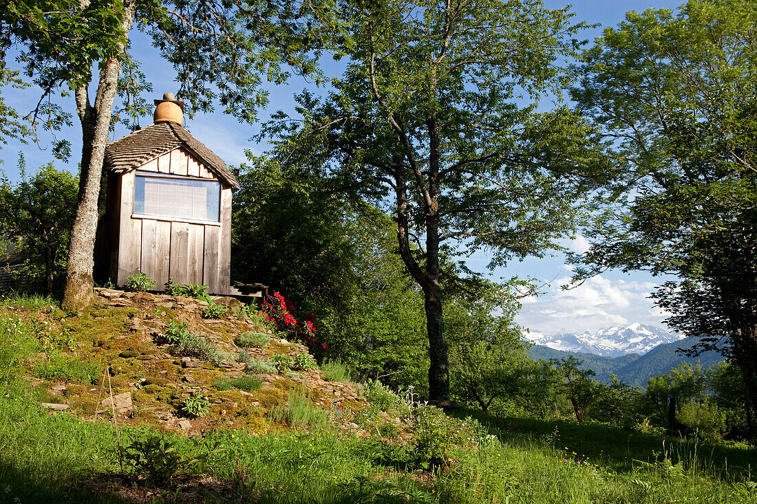 Wooden cabin in a mountain landscape