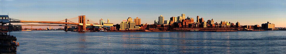 panoramic view of the Brooklyn waterfront, sunset light. Hudson Bay in the foreground