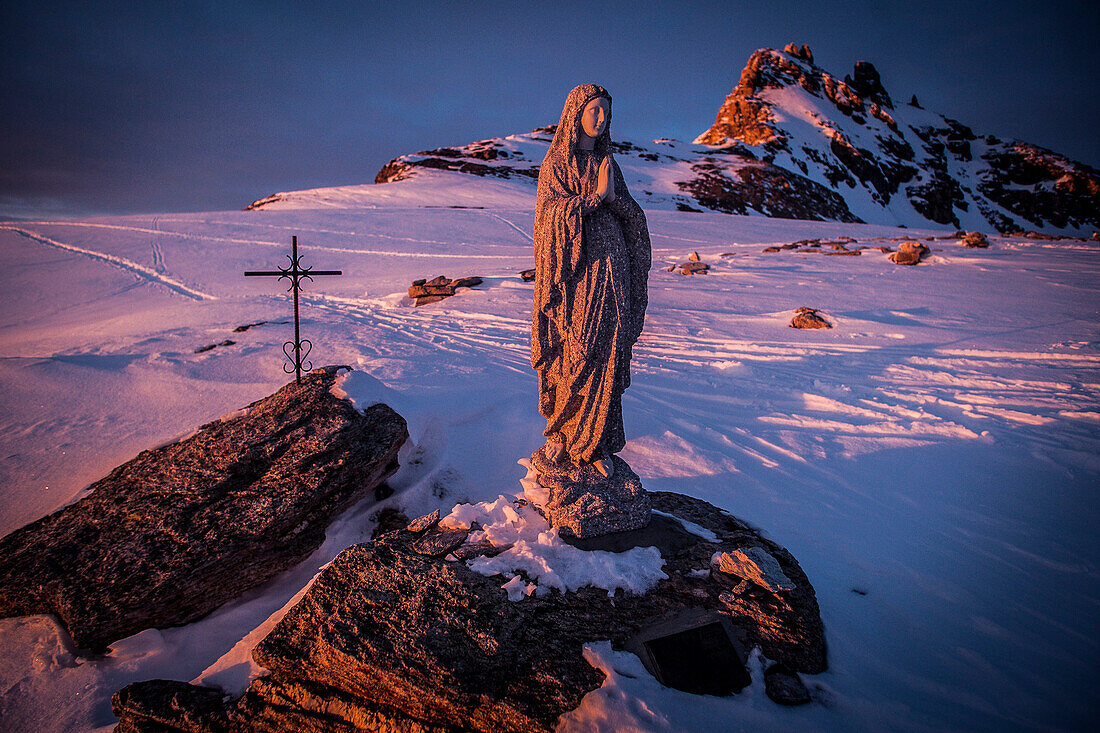 Switzerland, Grimentz, sunset on the virgin statue