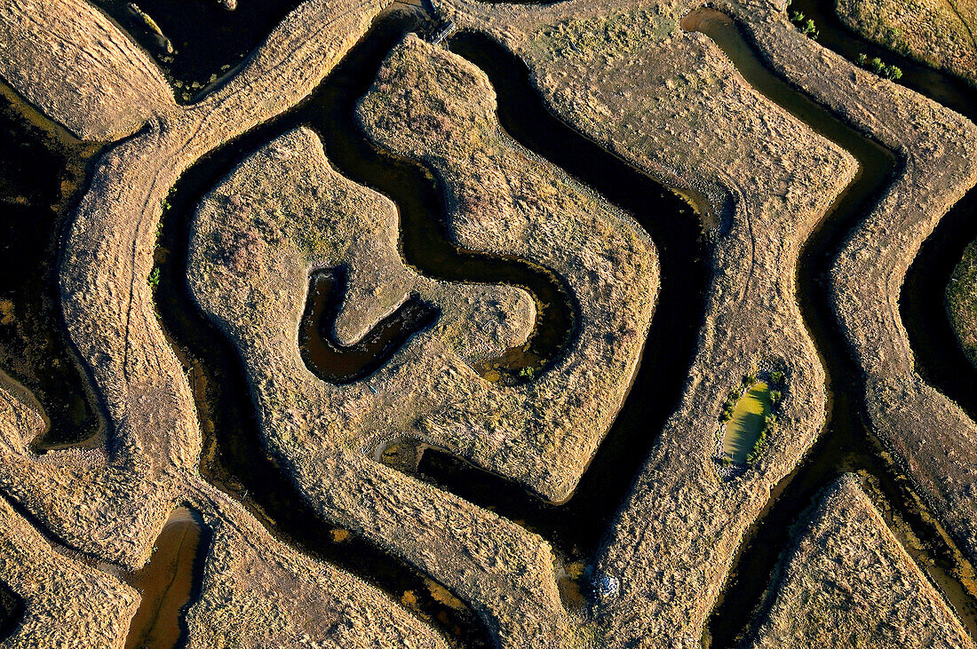 aerial view of the marsh. Basins shaped symbol