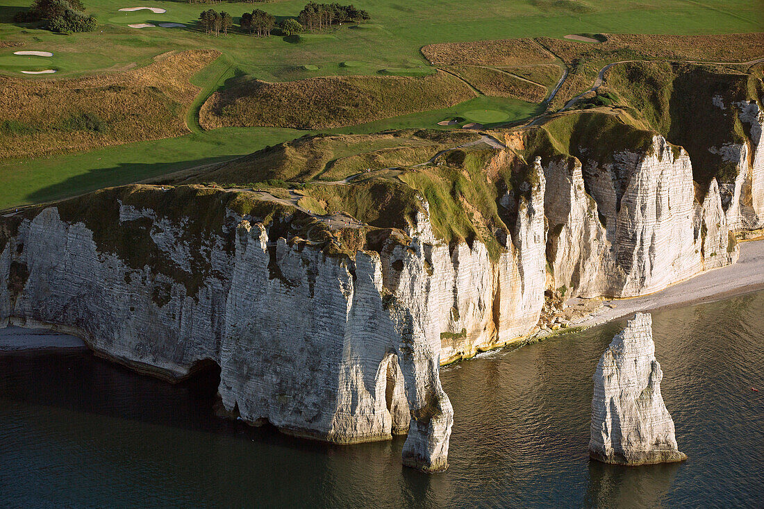 France, Seine-Maritime (76), Etretat, limestone cliffs have made it a place of international tourism (aerial view)