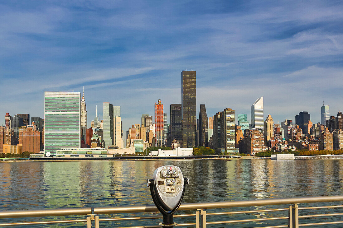 USA, New York City., Manhattan Skyline, UN Bldg. and East river