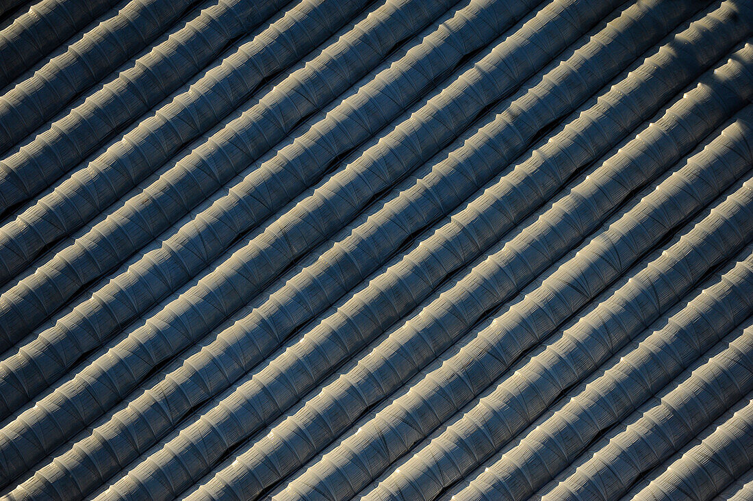 France. La Planche. Loire-Atlantique. Shooting diagonally from a series of greenhouses