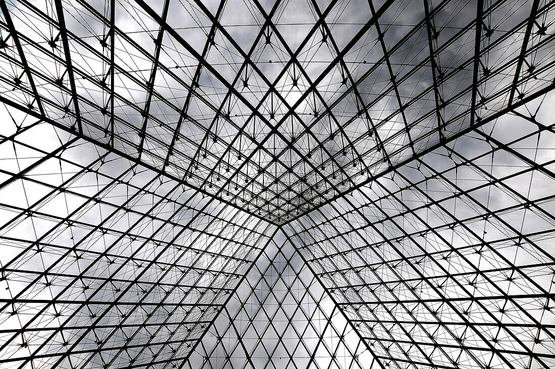 France. Detail of the structure of the glass pyramid of the Louvre in Paris