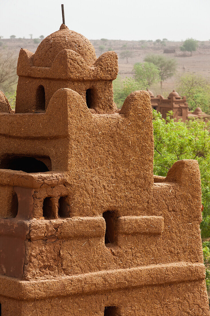 'Central Niger, Close up view of one of corner towers of Yaama mud brick mosque. Built 1962-1982 by Master builder El Hadji Falke Barmou using in a creative manner traditional mud brick techniques from Tahoa Region; Yaama Village'