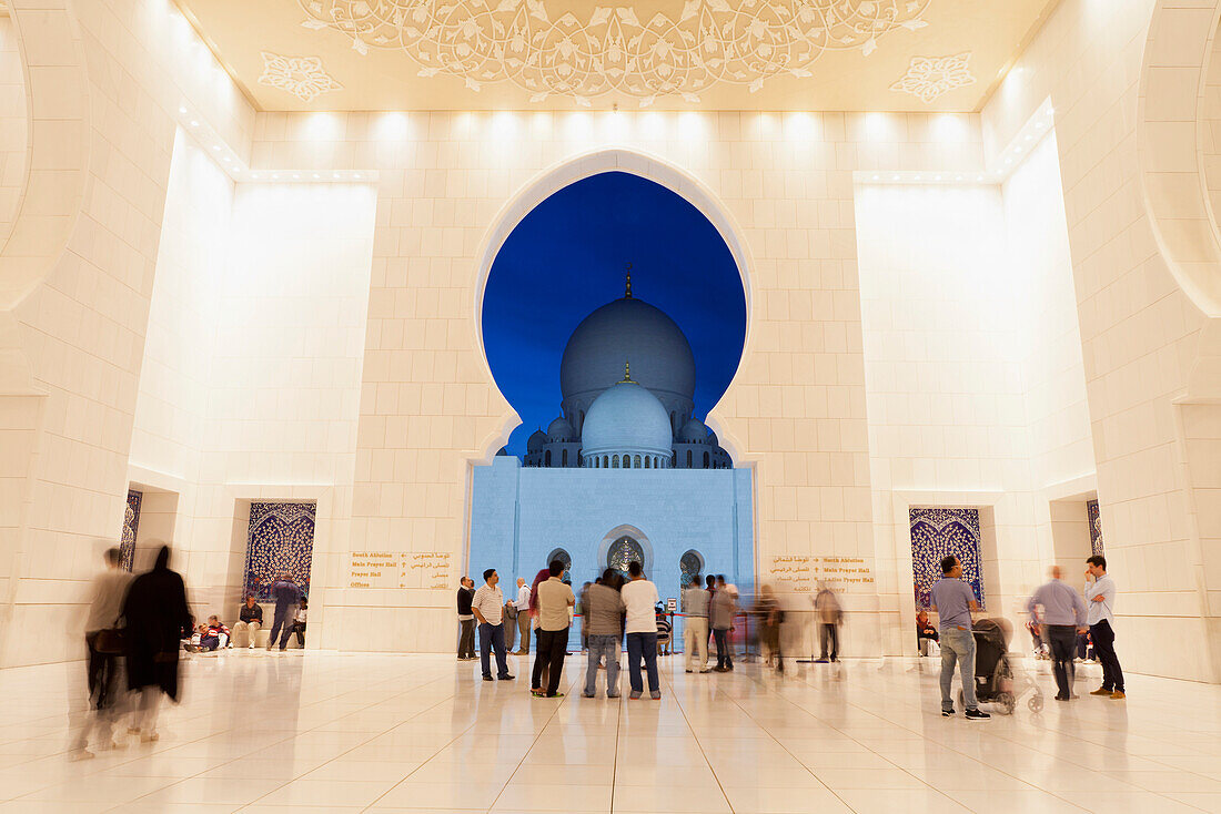 'The entrance of Sheikh Zayed Grand Mosque at night; Abu Dhabi, United Arab Emirates'