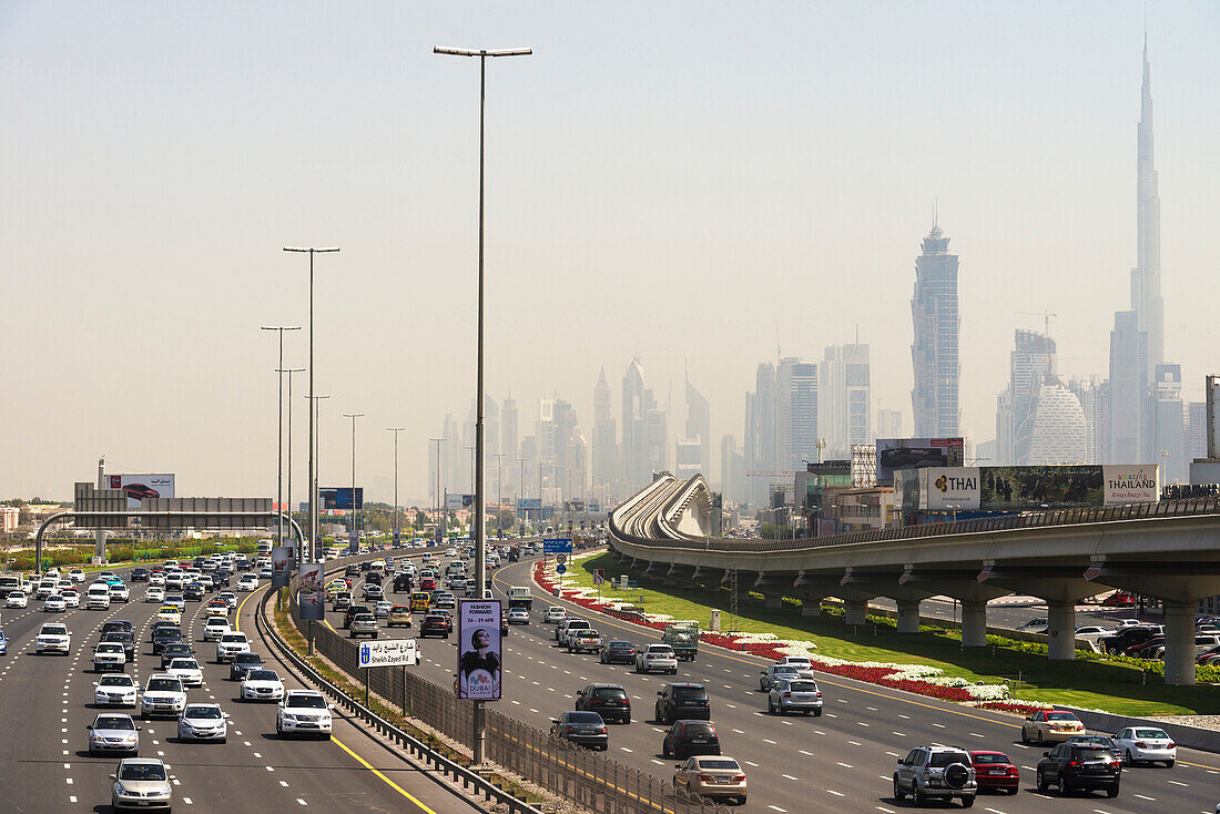 'Looking along Sheikh Zayed road towards the business district and Burj Khalifa; Dubai, United Arab Emirates'