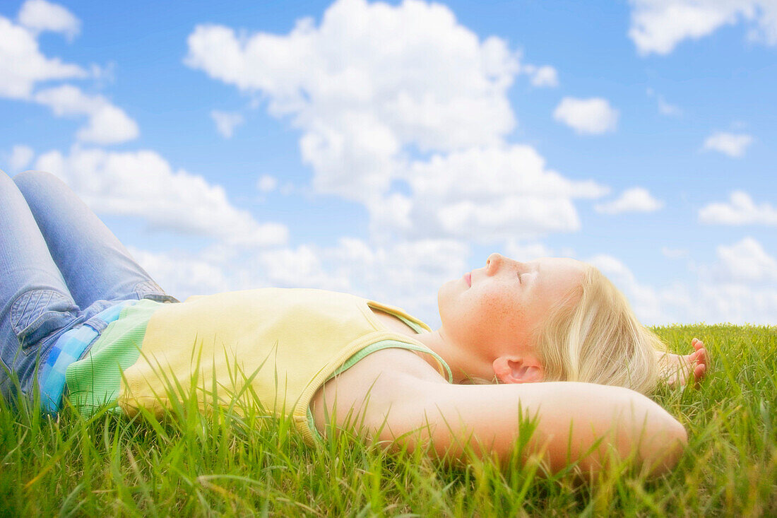 Girl Resting On The Grass