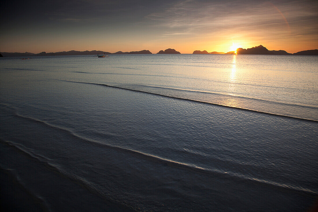 'Water Washing On Shore At Sunset; Corong Corong, Bacuit Archipelago, Palawan, Philippines'
