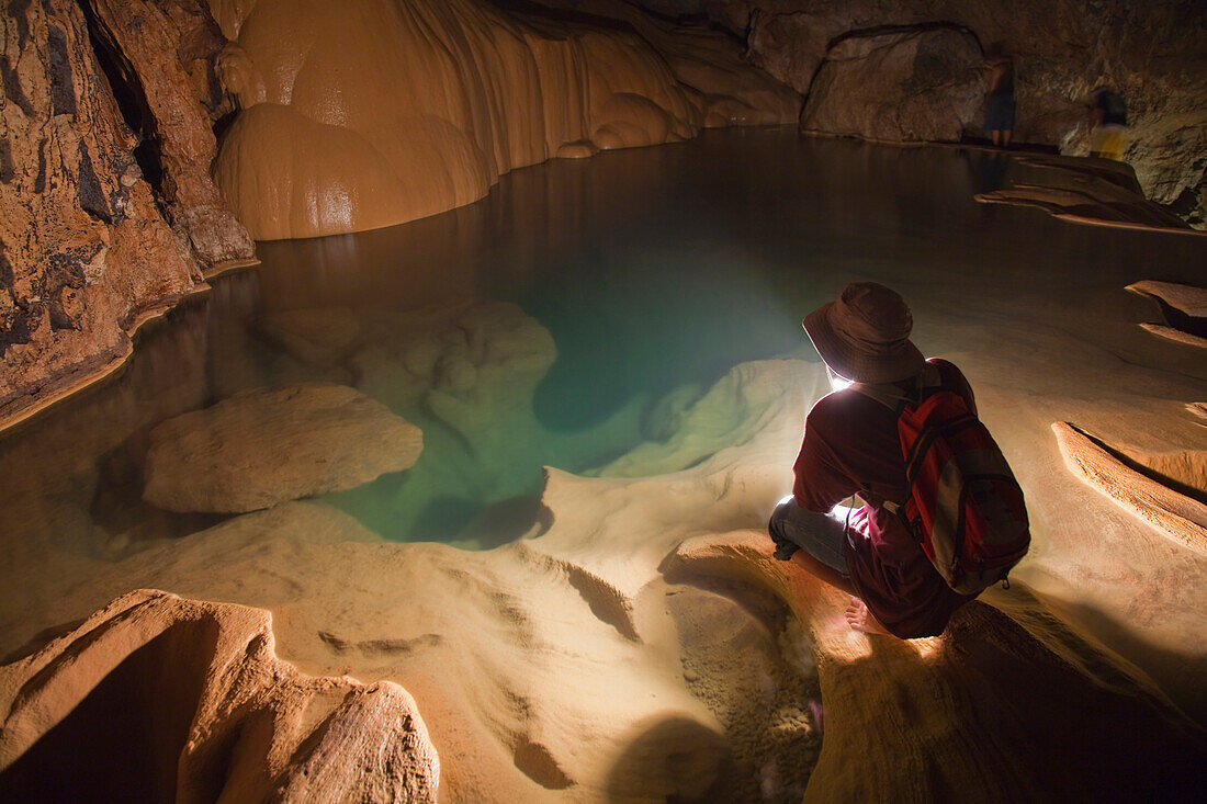 'A Filipino Tour Guide Holds A Lantern Inside Sumaging Cave Or Big Cave Near Sagada; Luzon, Philippines'