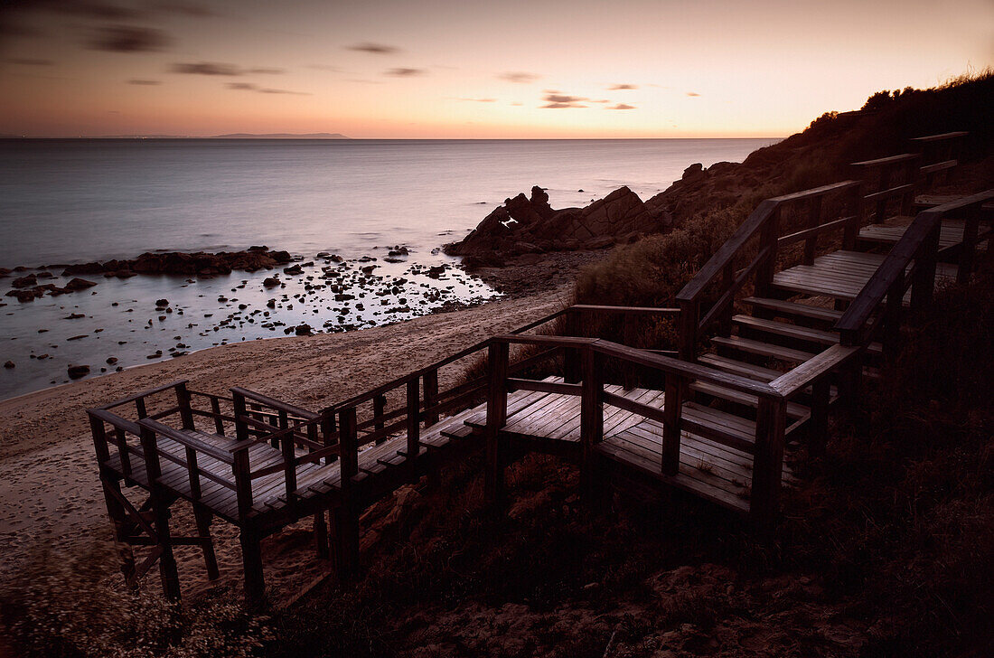 'A Wooden Staircase Leading Down To The Beach; Tarifa, Cadiz, Andalusia, Spain'
