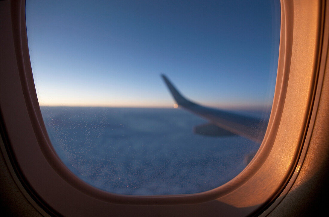 'View From Cabin Of Embraer 190 Aircraft At Sunset; Manitoba, Canada'