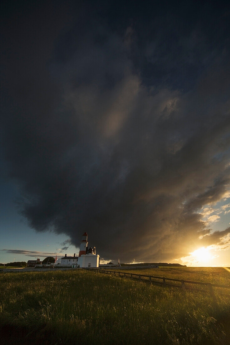 'Storm cloud formation over a lighthouse at sunset;South shields tyne and wear england'