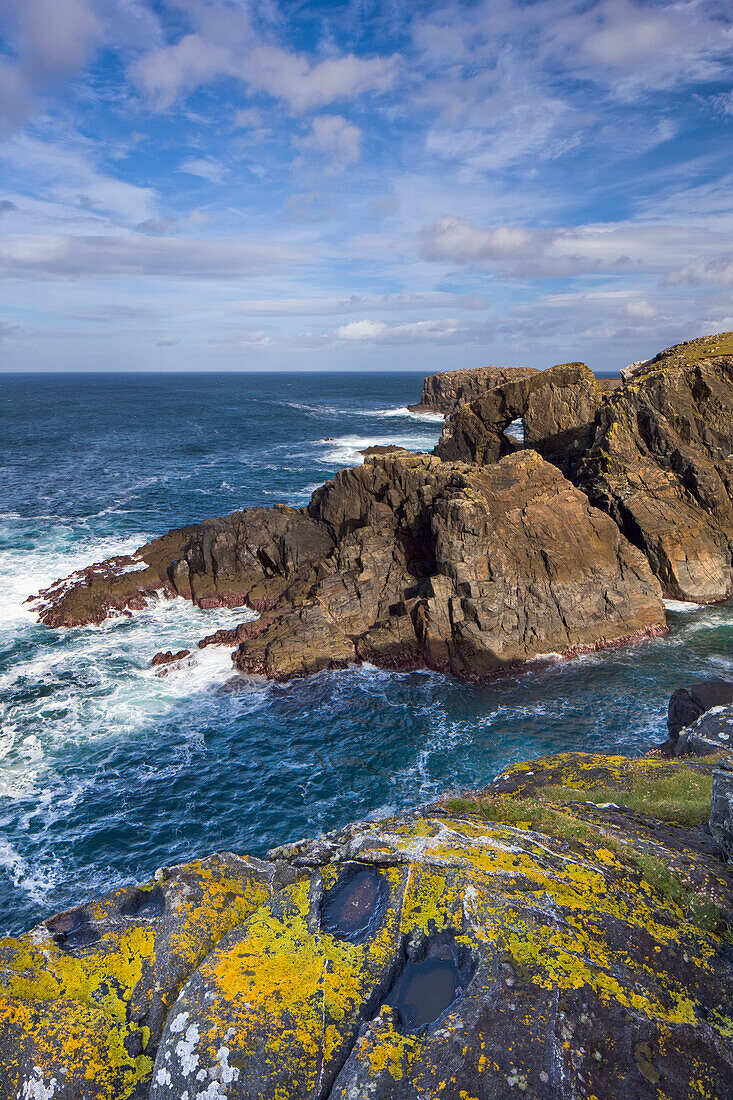 'The west coast of lewis boasts a superb array of dramatic cliffs and sea stacks and the occasional natural arch;Isle of lewis outer hebrides scotland'