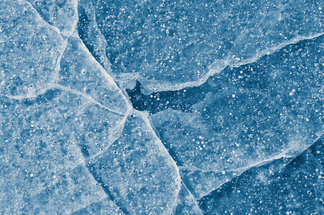 Close Up Of Cracks In The Ice Of Nenana River Near Denali National Park, Southcentral Alaska, Winter