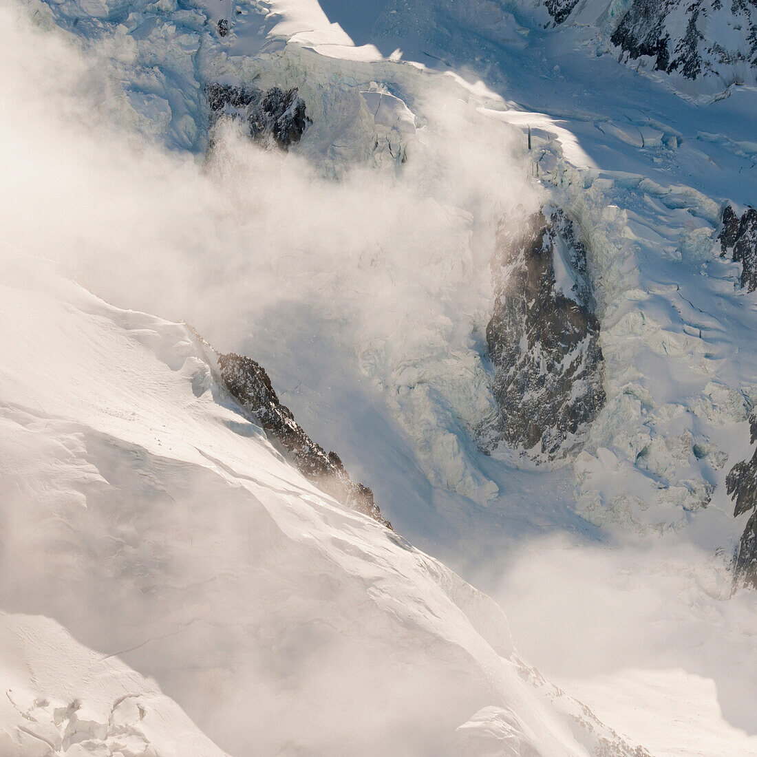 'Aerial view of snow covered mountains with cloud;Chamonix-mont-blanc rhone-alpes france'