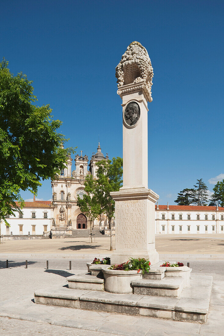 'Monument To Manuel Vieira Natividade With 12Th Century Cistercian Monastery Of Santa Maria In The Background; Alcobaca, Estremadura And Ribatejo, Portugal'