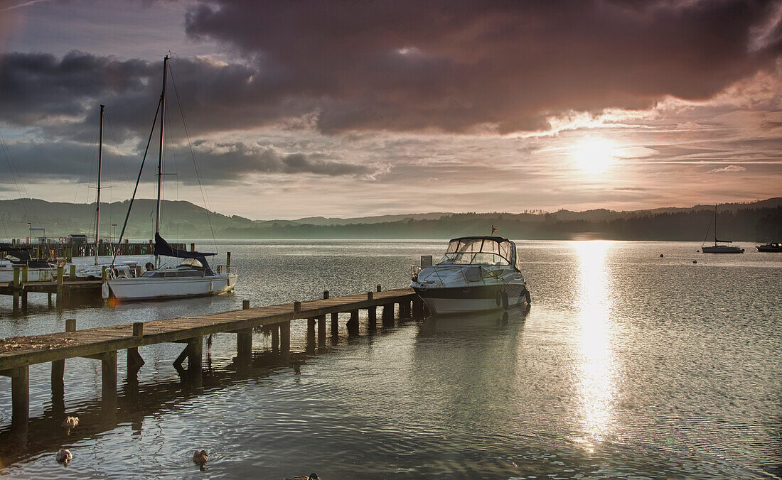 'Docked Boat On Lake Windermere At Sunset; Ambleside, Cumbria, England'