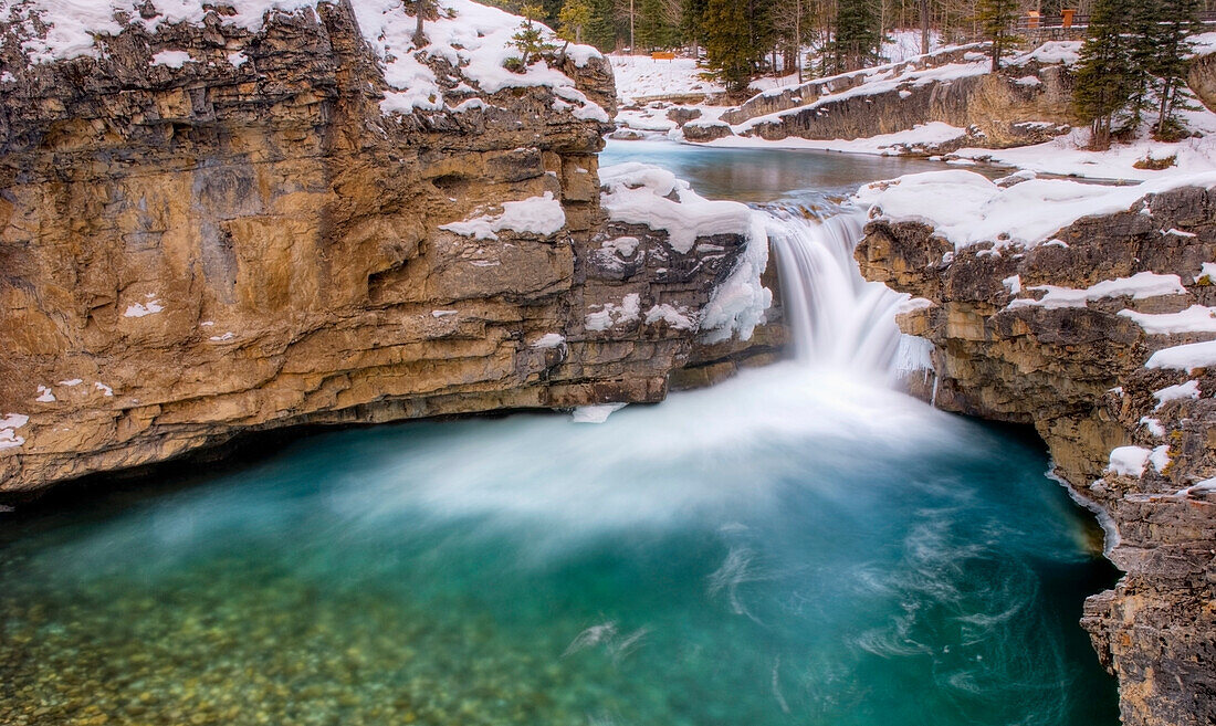 'Partially Frozen Waterfall In The Canadian Rockies; Bragg Creek, Alberta, Canada'