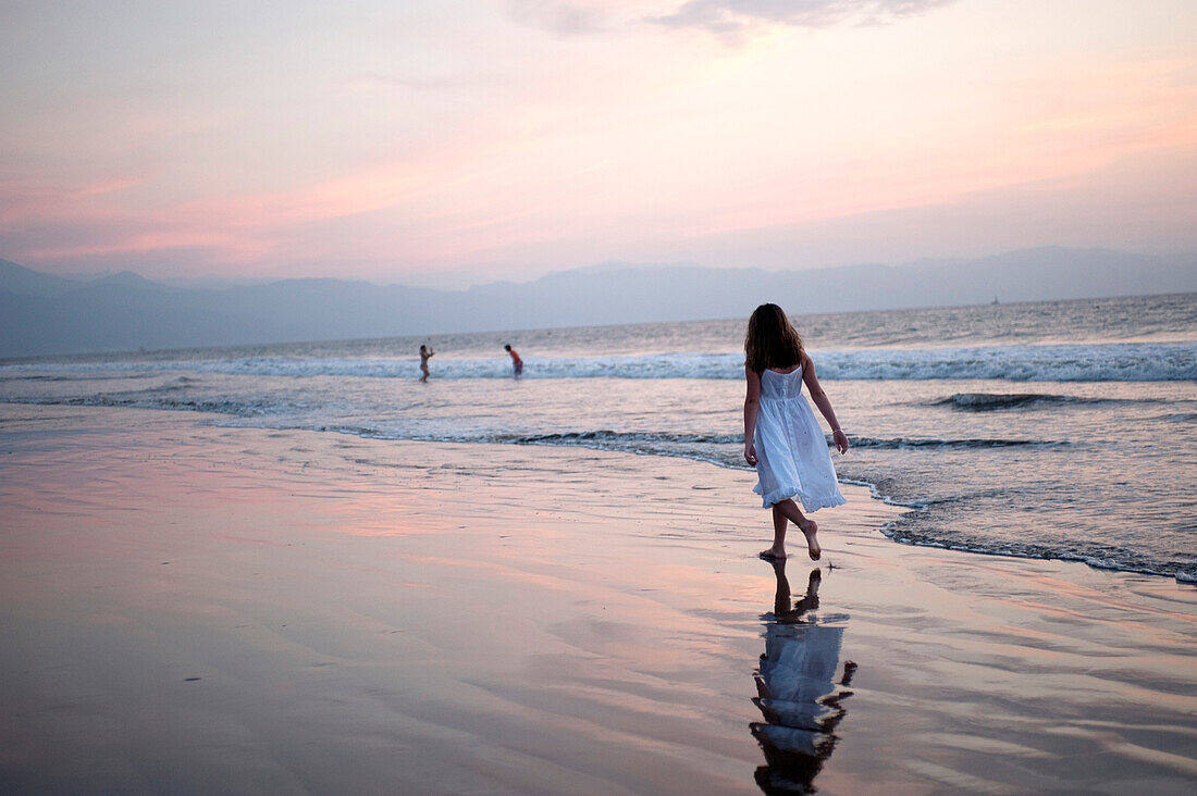 'Puerto Vallarta, Mexico; Girl Walking On The Beach'
