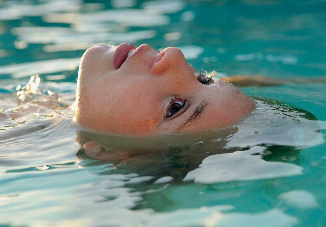 Girl Floating In The Water