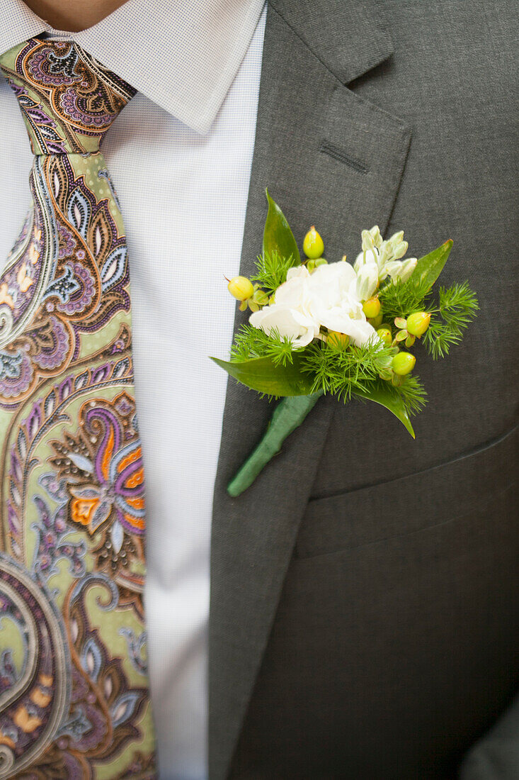 'Groom's boutineer and tie detail; Starkville, Mississippi, United States of America'
