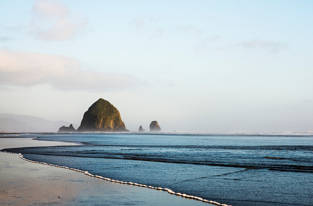 'Haystack Rock at Cannon Beach, a famous landmark; Cannon Beach, Oregon, United States of America'