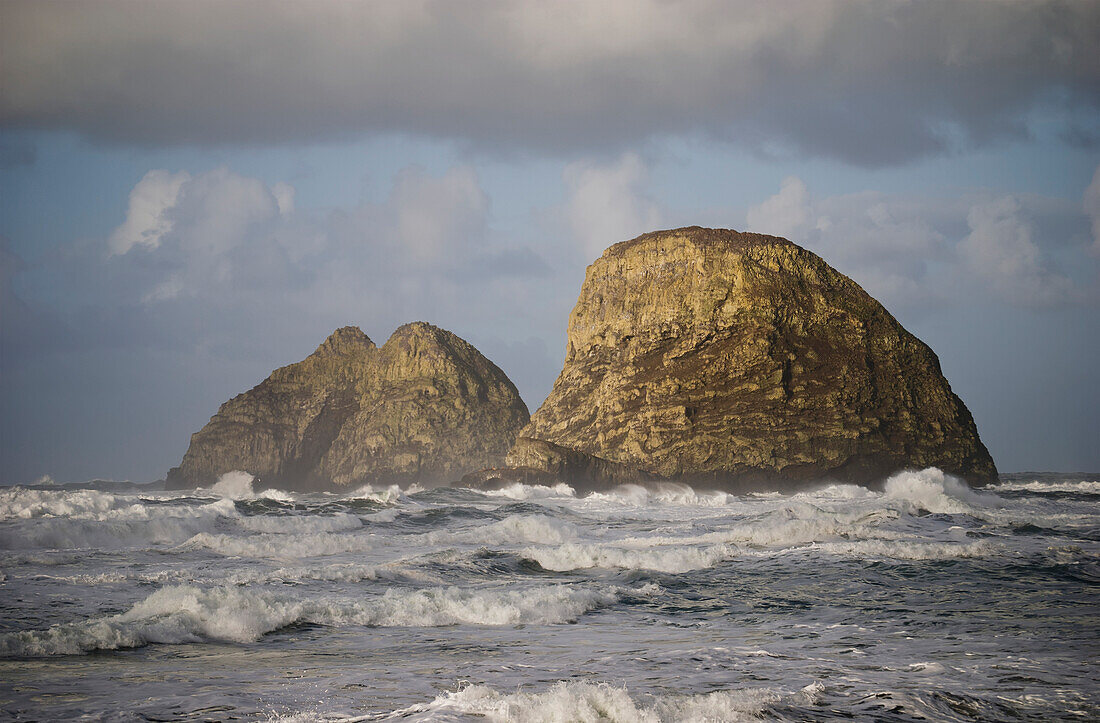 'Waves break near Three Arch Rocks; Oceanside, Oregon, United States of America'