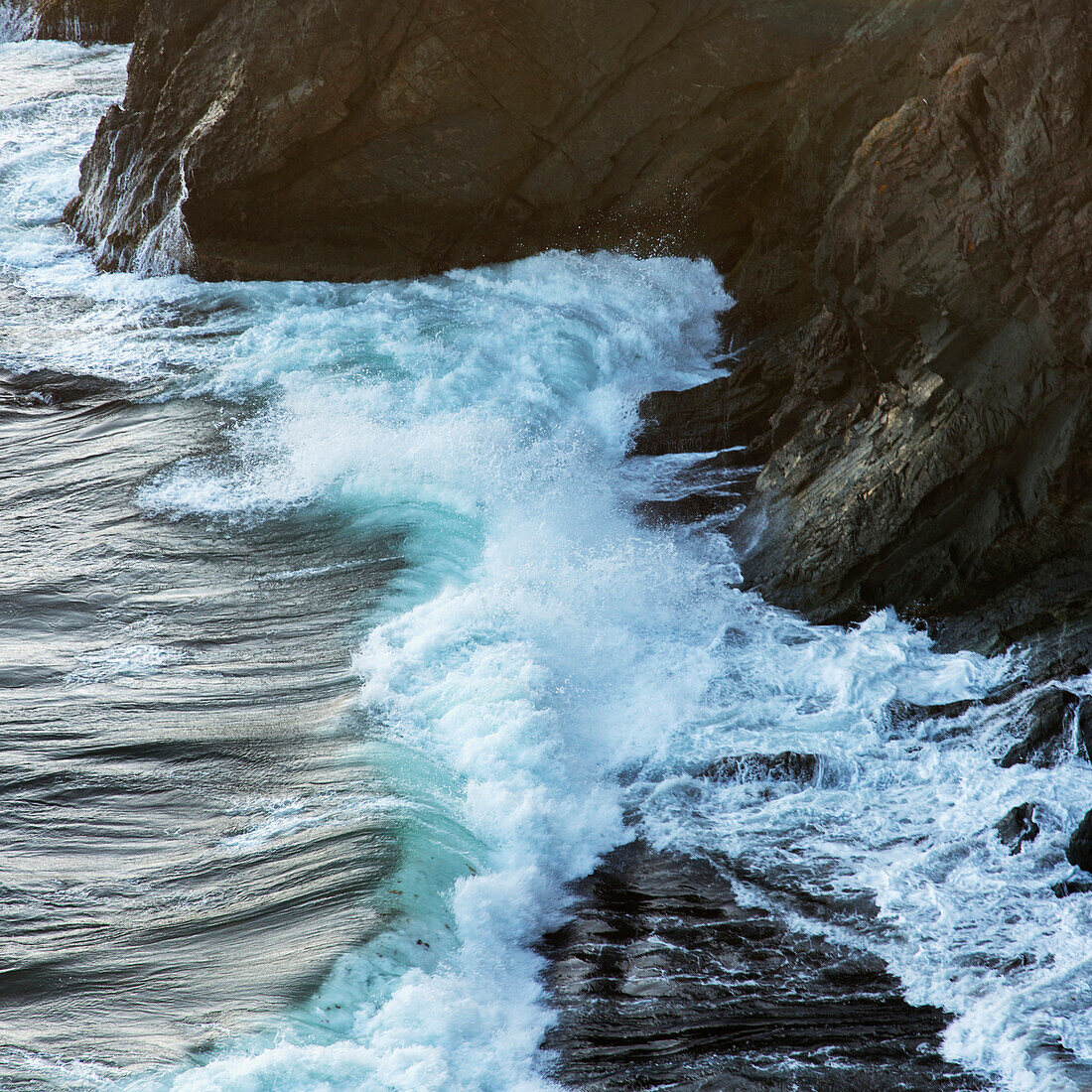'Waves crashing against the rugged atlantic coast; Port Rexton, Newfoundland and Labrador, Canada'