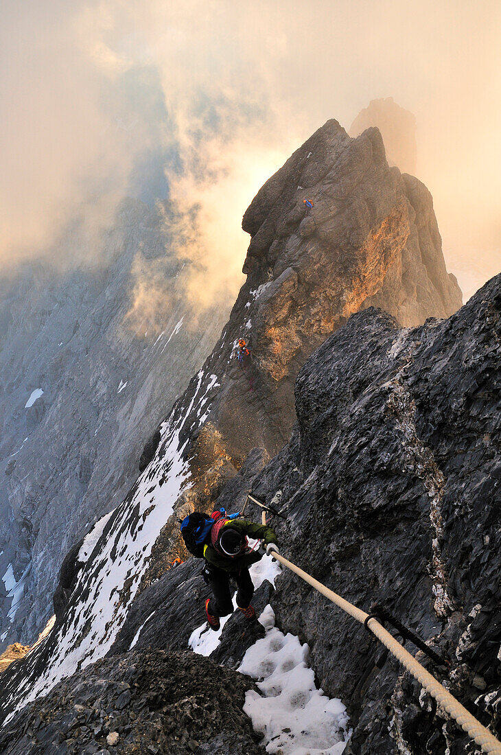 At the Great Tower: mountaineers on the Mitteleggi-Ridge, Eiger (3970 m), Bernese Alps, Switzerland