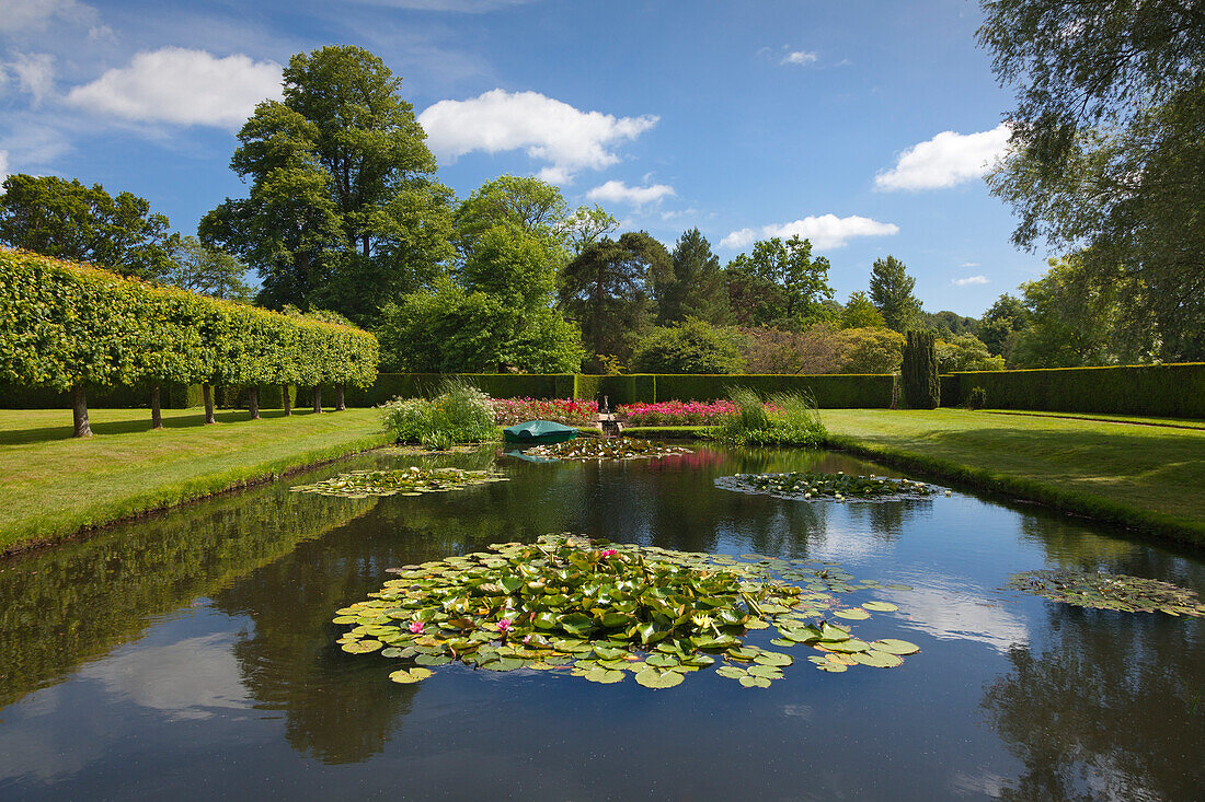 View across the lily pond, Bateman's, home of the writer Rudyard Kipling, East Sussex, Great Britain